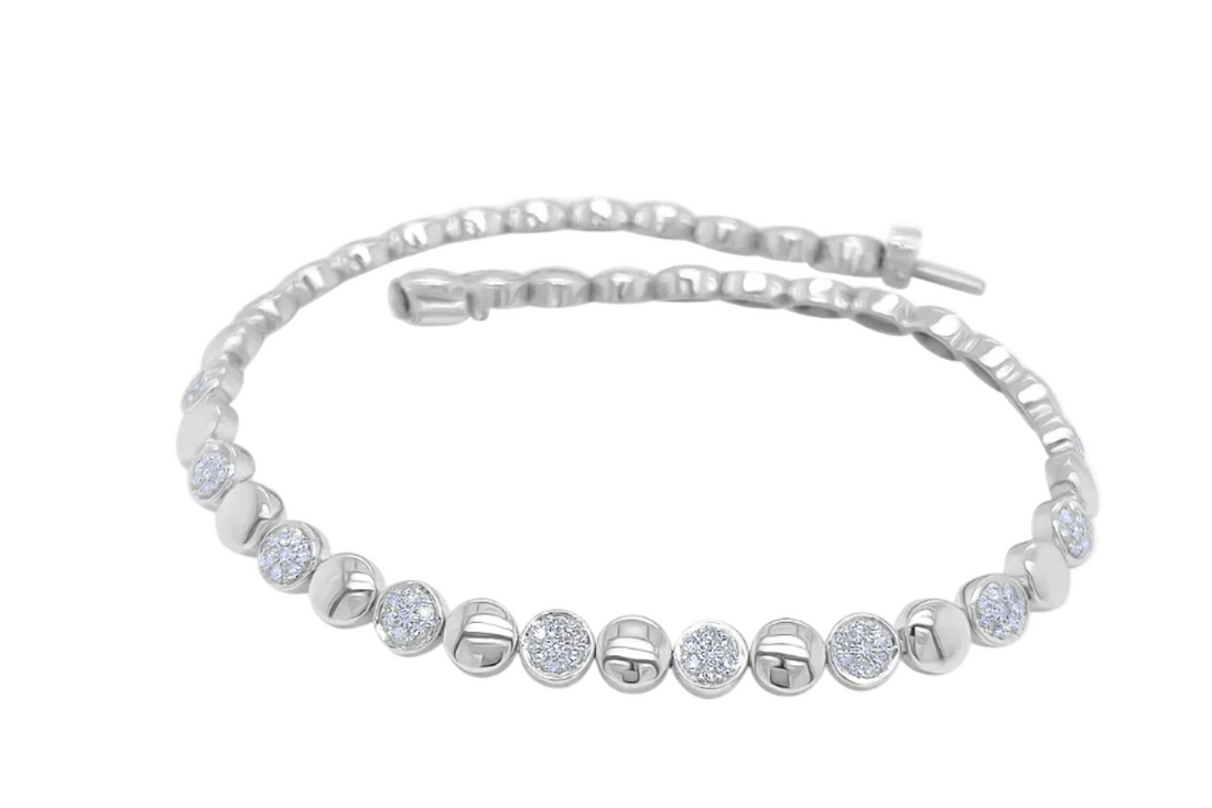 14k white gold bracelet with 147 round brilliant diamonds totaling 0.66 ctw by Diamond Tales