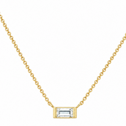 14k yellow gold necklace with a 0.20 ct emerald-cut diamond pendant