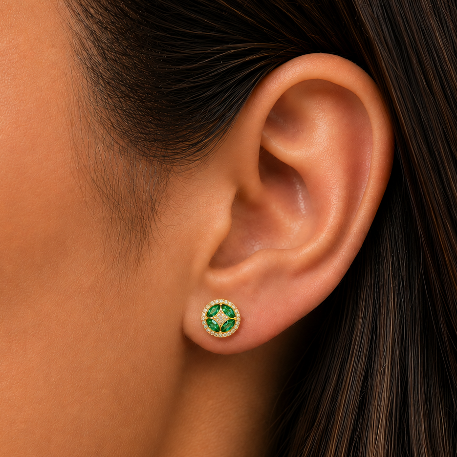 14k gold flower stud earrings with oval emeralds and round diamonds