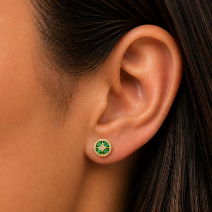 14k gold flower stud earrings with oval emeralds and round diamonds