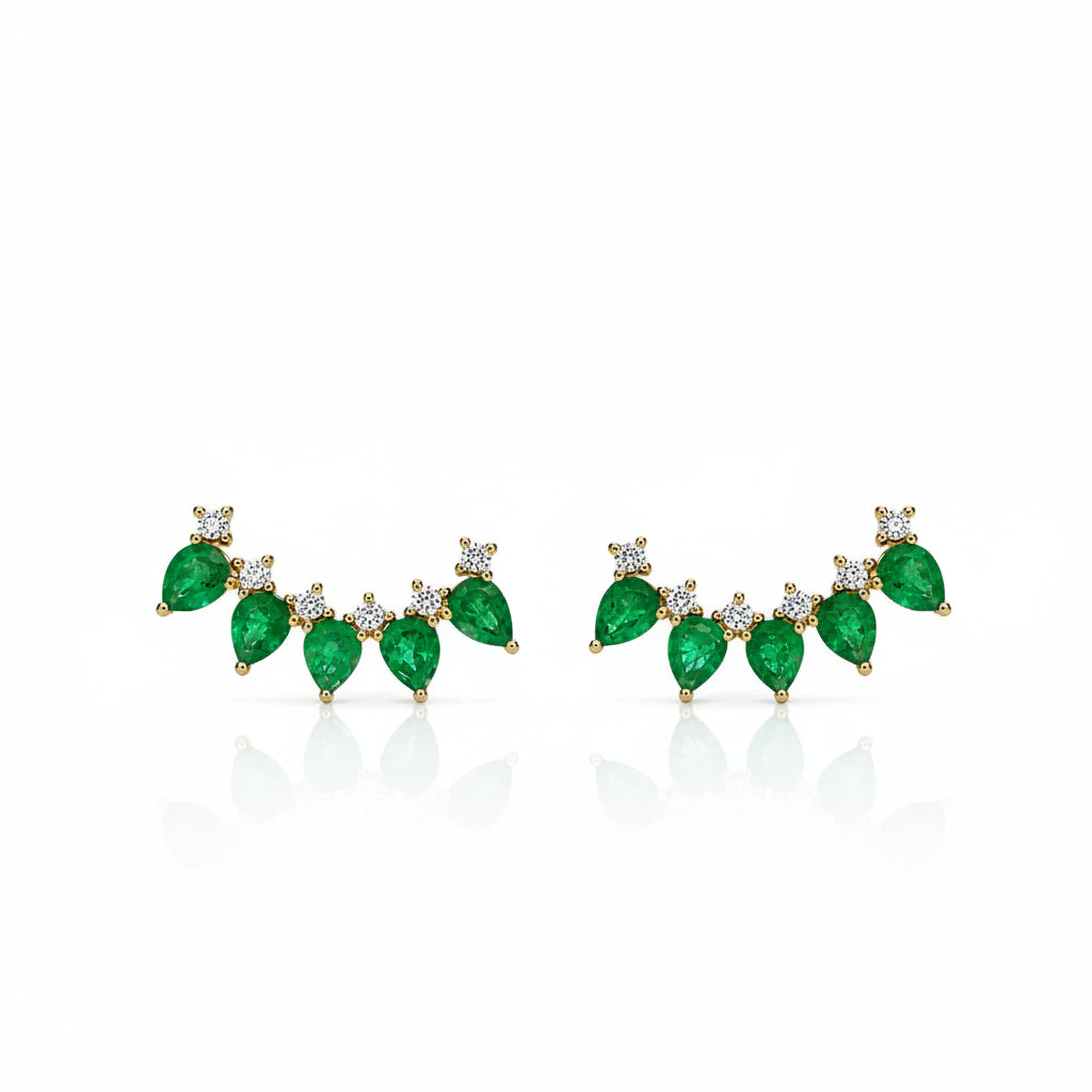 14k yellow gold crawler earrings with pear emeralds and diamonds