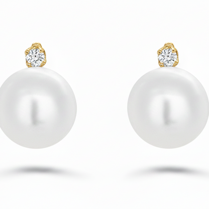 14k gold stud earrings with 8.5 mm pearls and 0.04 cts diamonds