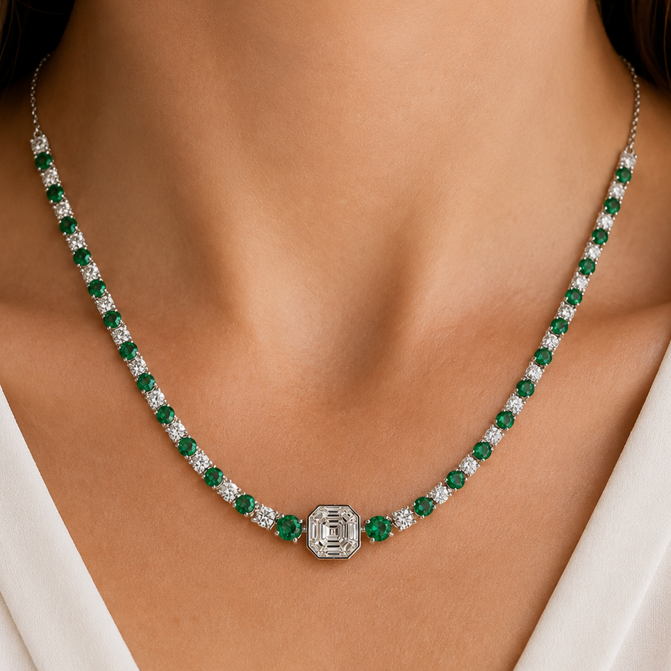 model wearing 14k white gold emerald and diamond tennis necklace