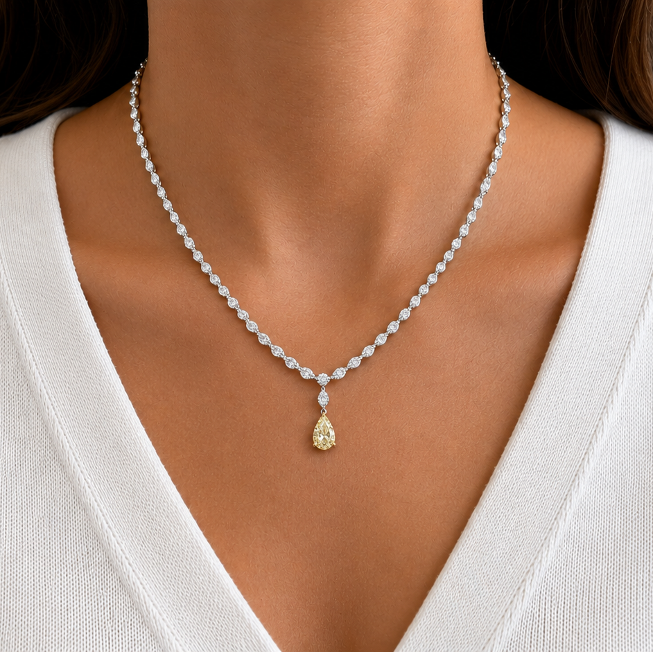 model wearing 14k white gold fancy light yellow diamond pendant necklace