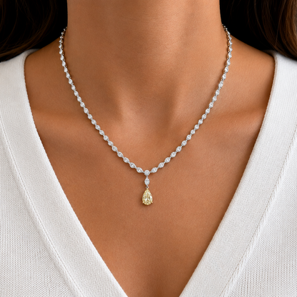 model wearing 14k white gold fancy light yellow diamond pendant necklace
