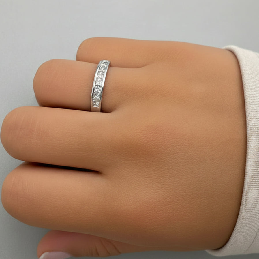 14k white gold half-band ring with eight channel-set diamonds totaling 0.74 cts