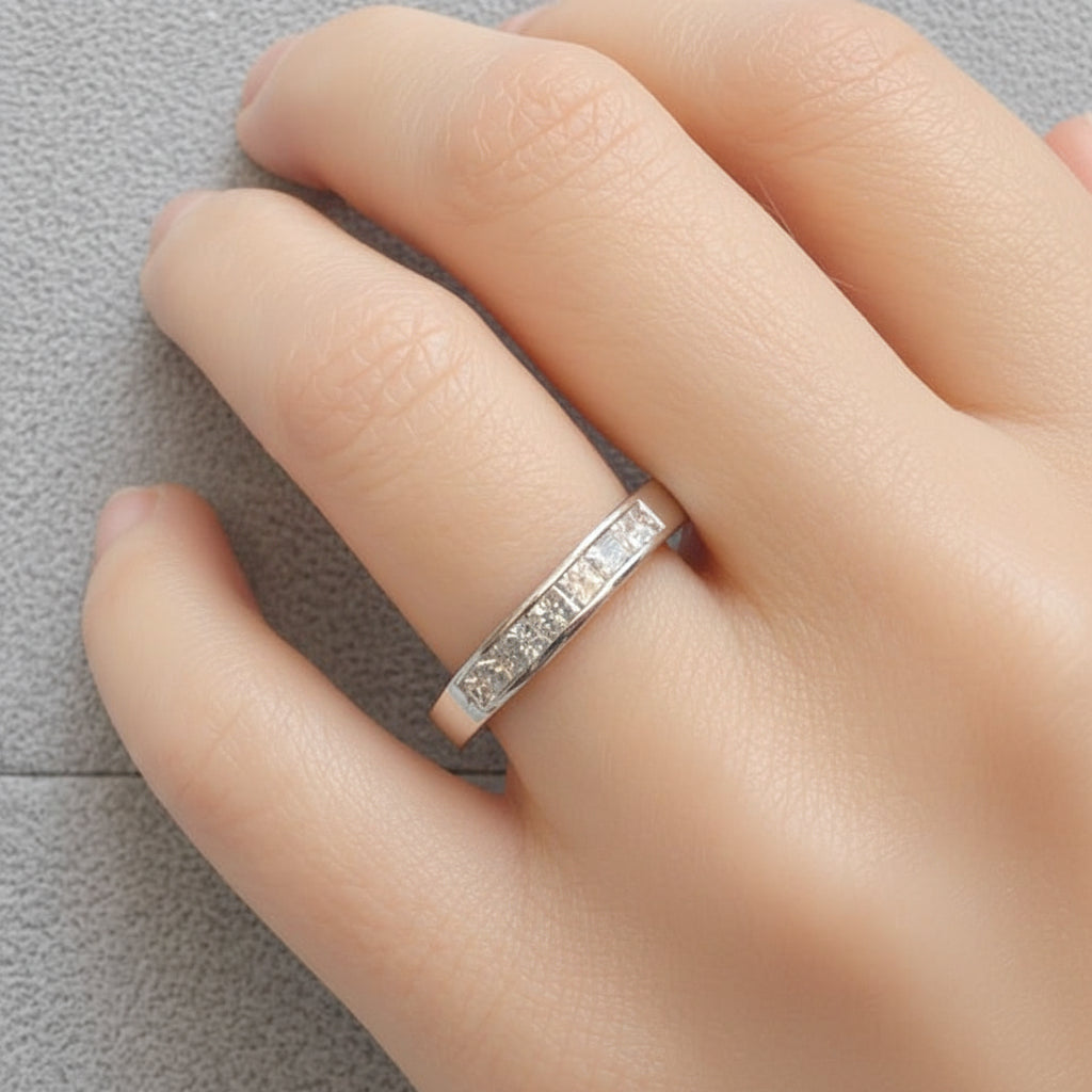 14k white gold half-band ring with seven channel-set diamonds (0.52 cts)