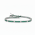 14k white gold tennis bracelet with 48 natural emeralds and 12 diamonds