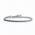 14k white gold tennis bracelet with gradient of natural blue sapphires