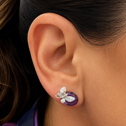 close up of amethyst and diamond butterfly stud earrings detail