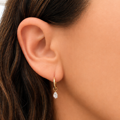 model wearing 14k yellow gold lab diamond mini hoop earrings