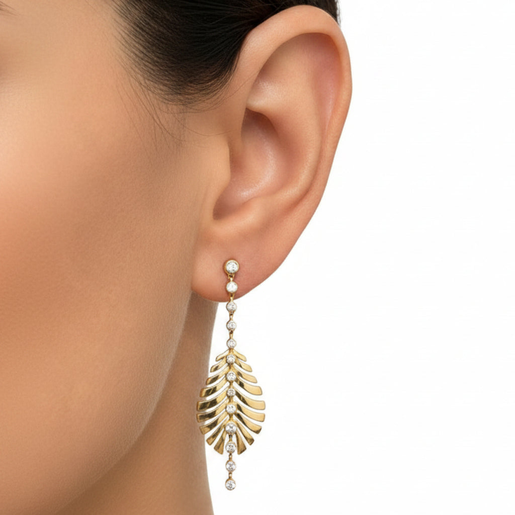 14k yellow gold leaf stud earrings with  pavé diamonds