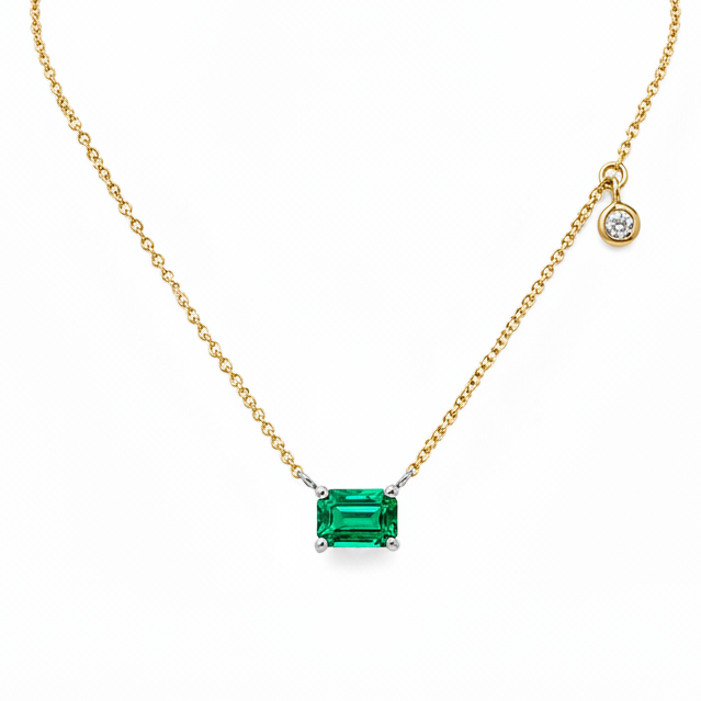 14k yellow gold necklace with natural emerald cut emerald and diamond