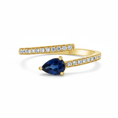 14k yellow gold spring ring with 0.48 ct pear sapphire and 0.14 cts diamonds