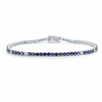 18k white gold tennis bracelet with 0.23 cts blue sapphires and 4.94 cts diamonds