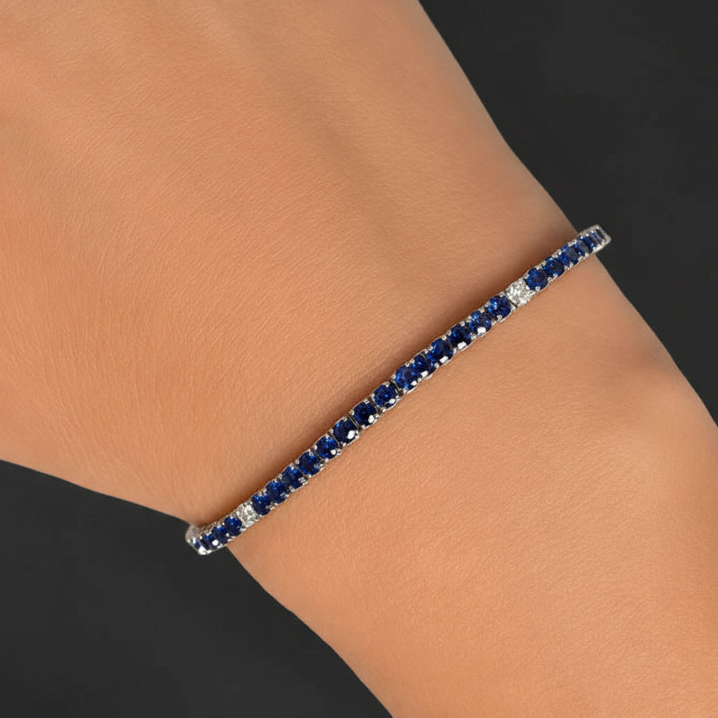 18k white gold tennis bracelet with 0.23 cts blue sapphires and 4.94 cts diamonds