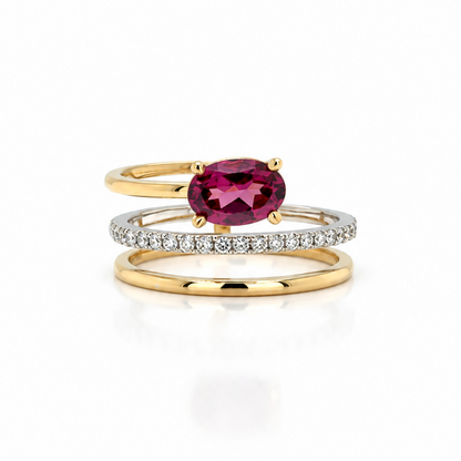 18k yellow and white gold spiral ring with a 0.89 ct oval red tourmaline and 23 diamonds