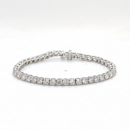 18k white gold tennis bracelet with 42 round brilliant diamonds totaling 6.40 cts