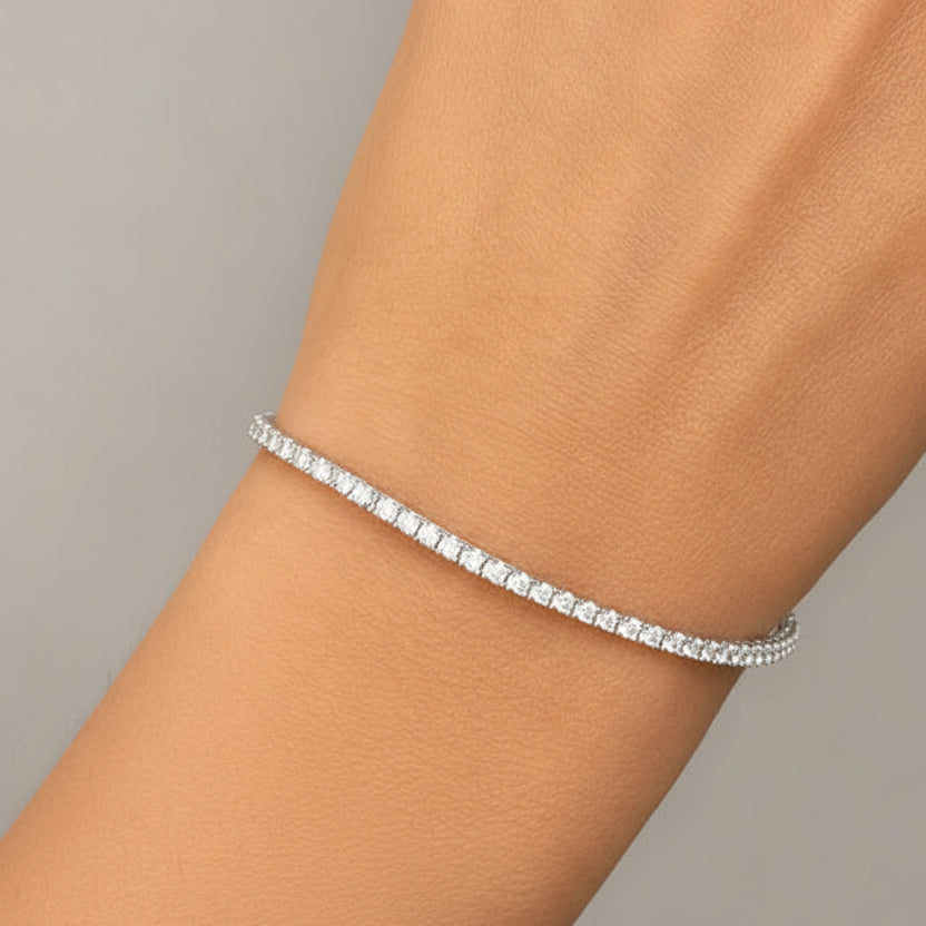 18k white gold tennis bracelet with 79 round brilliant diamonds totaling 1.50 cts