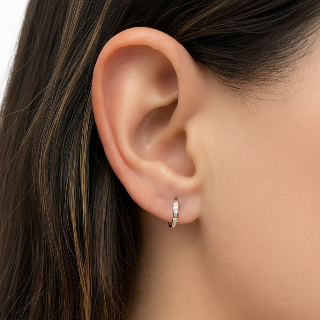 model wearing 18k white gold diamond mini hoop earrings
