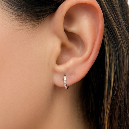 model wearing 18k white gold diamond mini hoop earrings