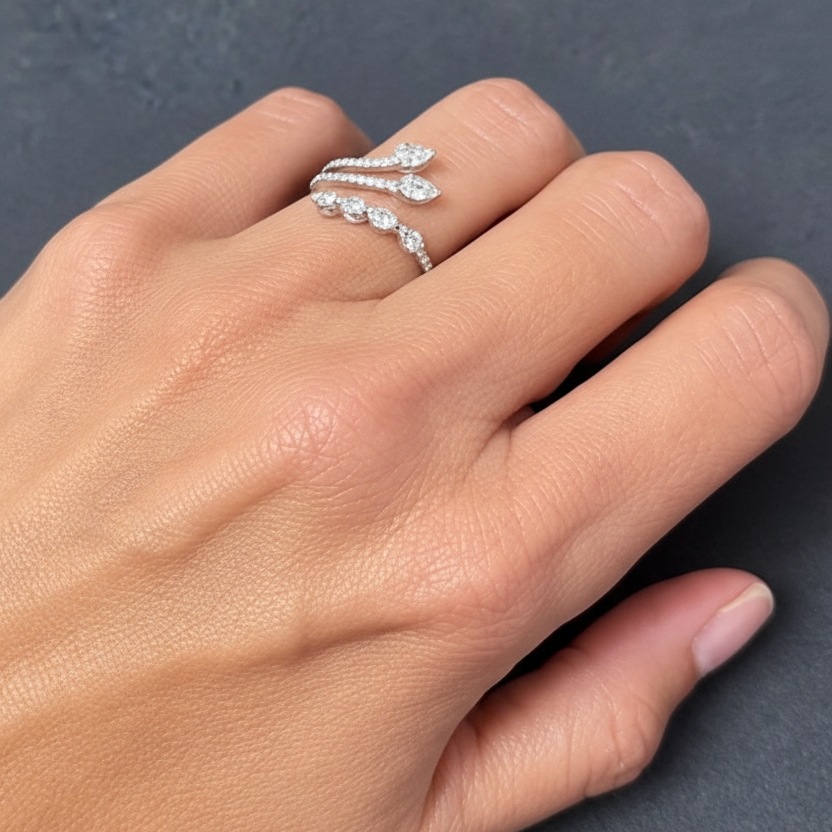 model wearing 18k white gold open baguette diamond ring on finger