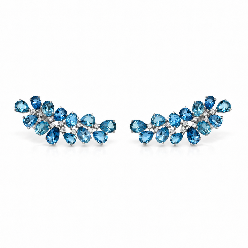 18k white gold ear climbers with 26 pear aquamarines totaling 6.93 ct and 22 diamonds