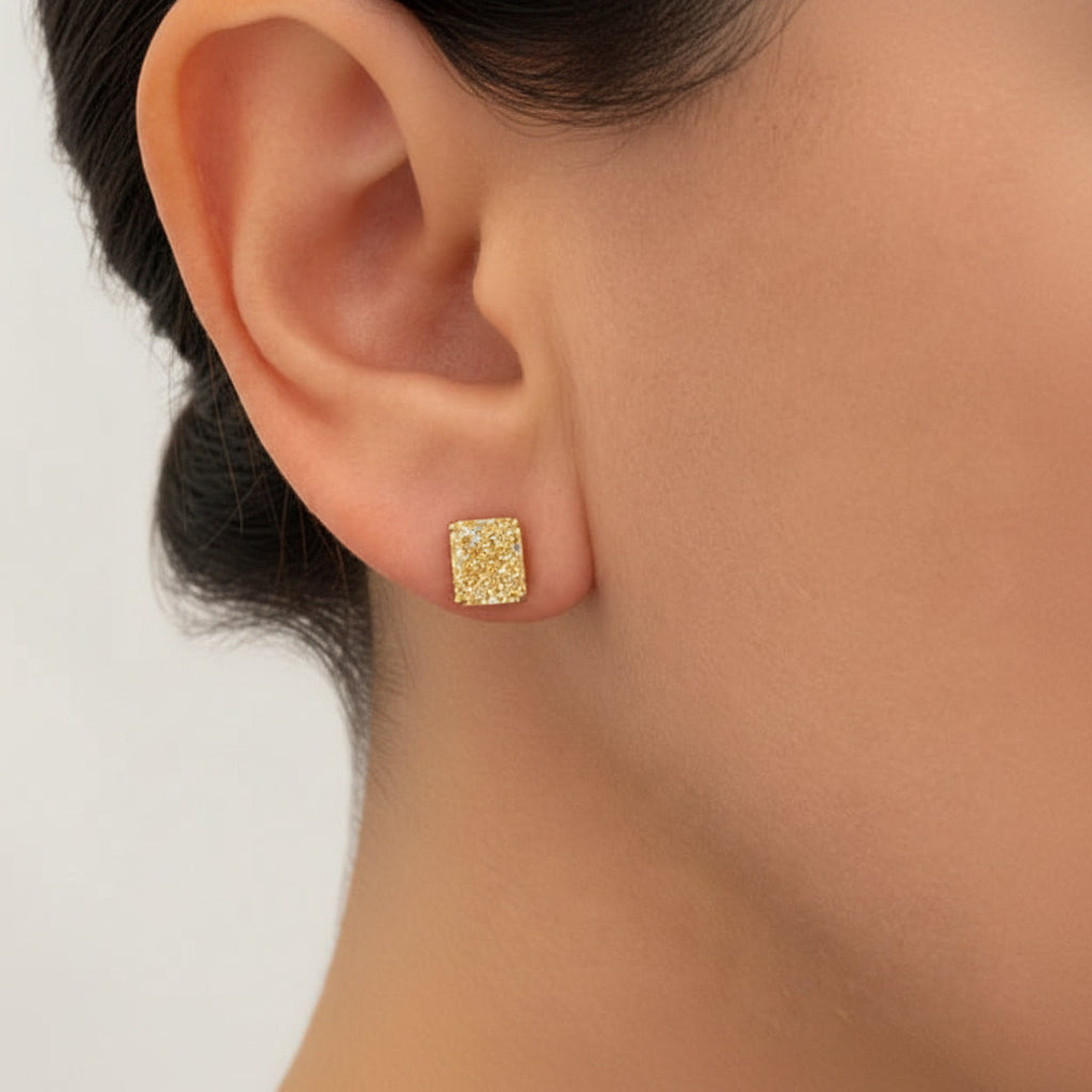18k yellow gold stud earrings with 4.10 ctw GIA-certified fancy yellow diamonds