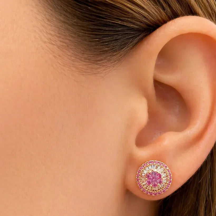 18k yellow gold cluster stud earrings with central pink sapphires and a diamond baguette-and-round border