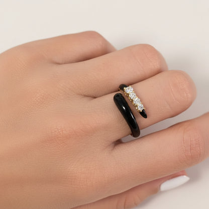 18k yellow gold open ring with black agate ends and four brilliant-cut diamonds totaling 0.32 carats