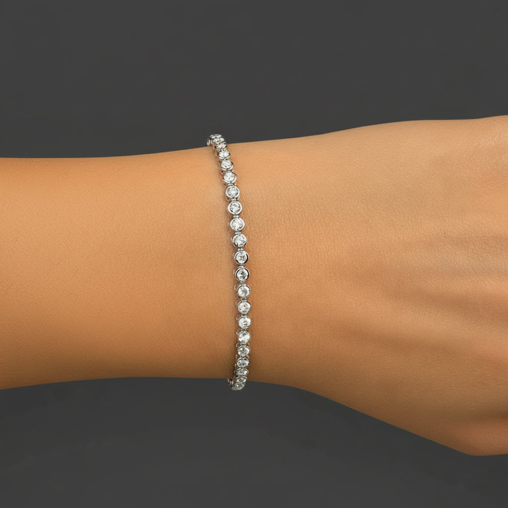 14k white gold tennis bracelet with 58 round brilliant diamonds totaling 2.00 ctw by Diamond Tales
