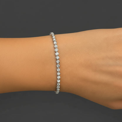 14k white gold tennis bracelet with 58 round brilliant diamonds totaling 2.00 ctw by Diamond Tales