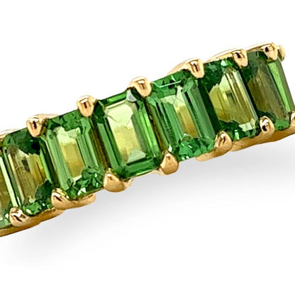 18k gold half band ring with 2.7 ctw emerald-cut tsavorite garnets by Diamond Tales
