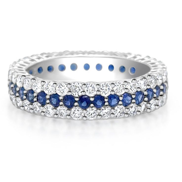 18k white gold full band ring with blue sapphires and round brilliant diamonds by Diamond Tales