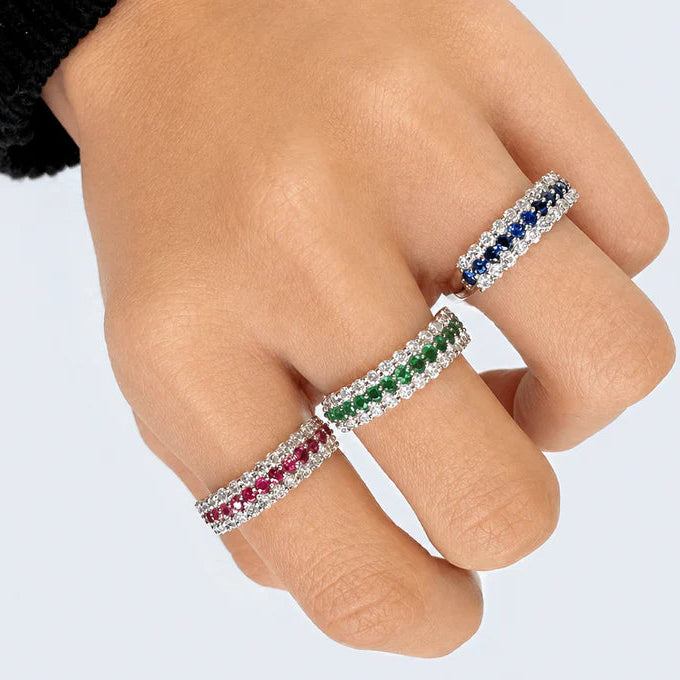 18k gold half band ring with emeralds and round brilliant diamonds by Diamond Tales