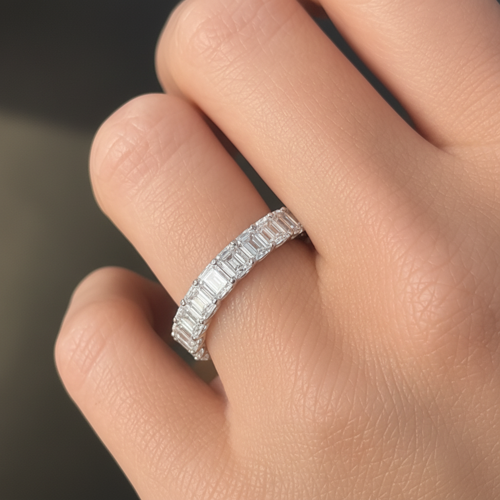 Platinum eternity ring with 5.16 ctw emerald-cut lab-grown diamonds by Diamond Tales