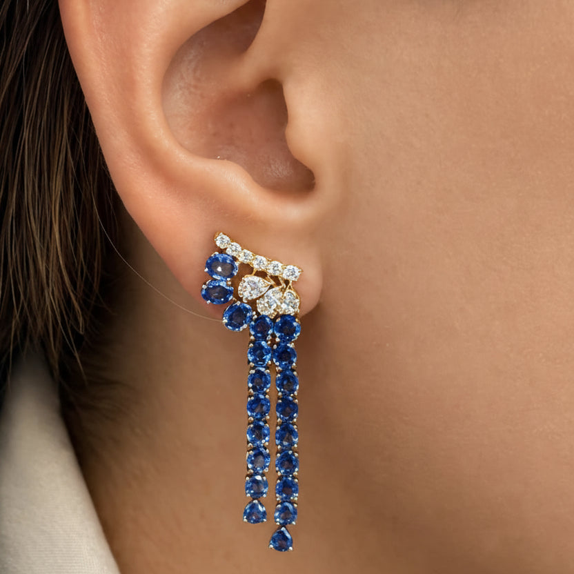 Twin-strand drop earrings in 18k yellow and white gold with blue sapphires and diamonds by Diamond Tales