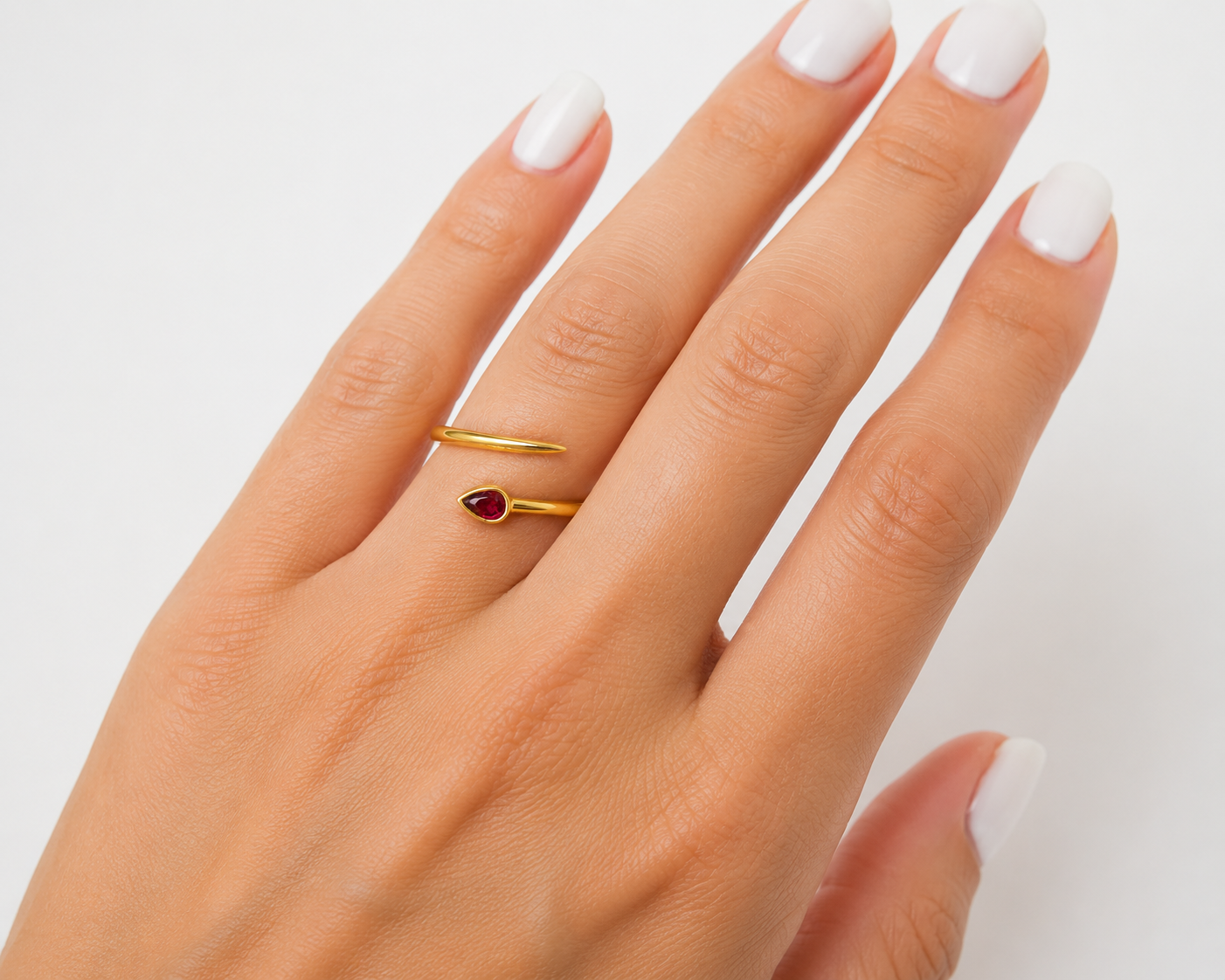 pear shape ruby ring in 14k yellow gold, detail view
