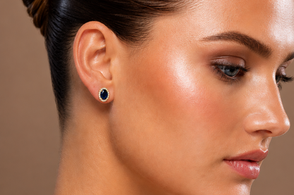oval blue sapphire and diamond halo studs in 14k gold, detail view