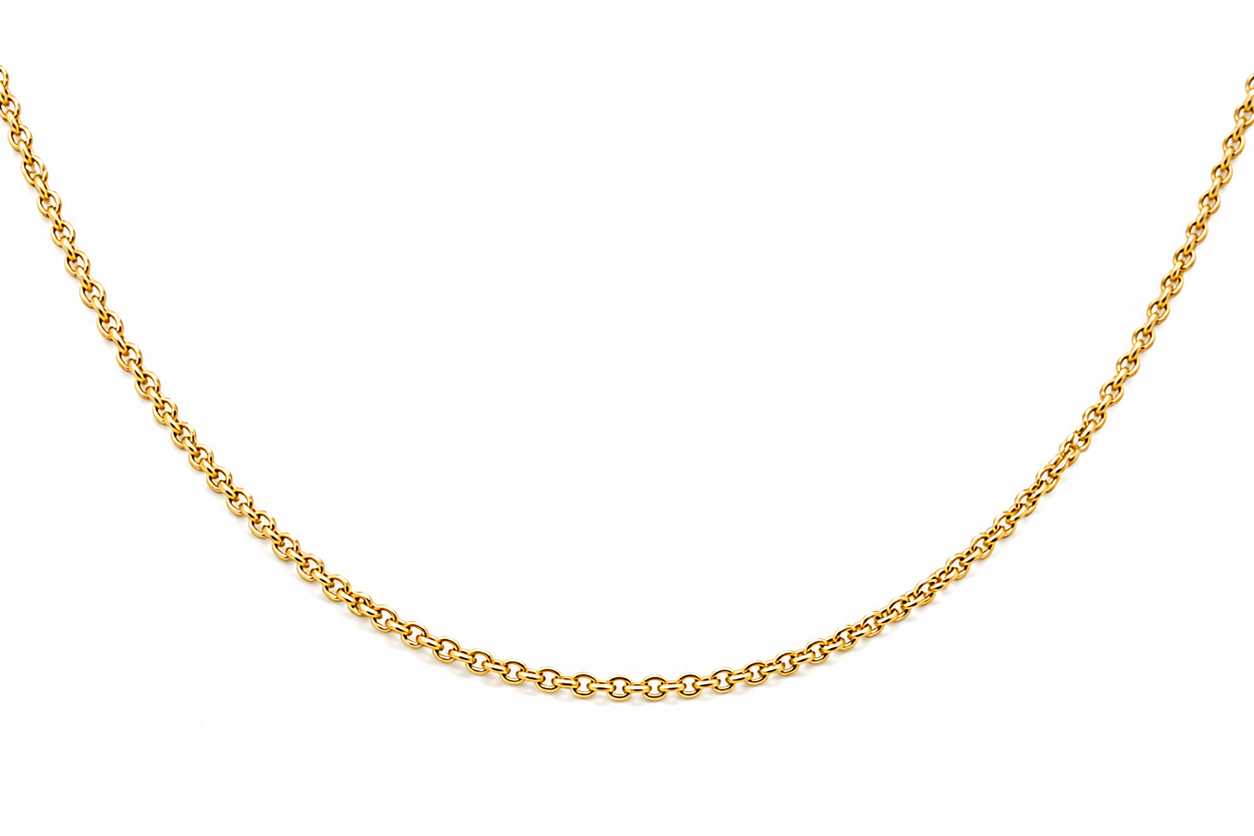 18k gold rolo chain worn at the collarbone, close up