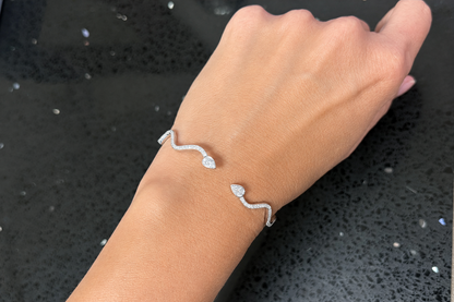 diamond open bangle bracelet in 14k white gold, pear diamond detail