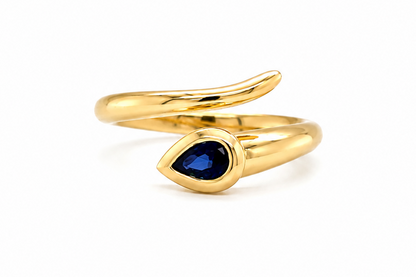 adjustable 14k gold ring with pear shape blue sapphire, close up