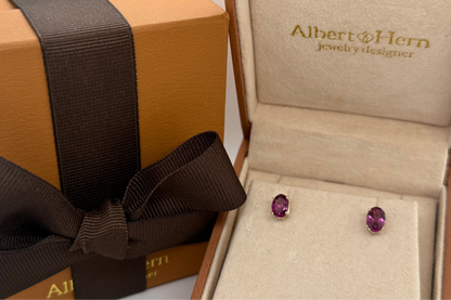 natural tourmaline studs in four prong setting, close up