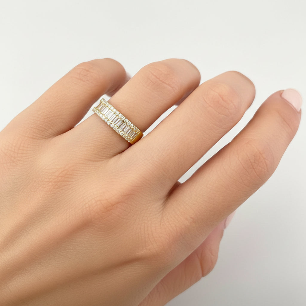 Round and baguette diamond band in 18k yellow gold by Diamond Tales