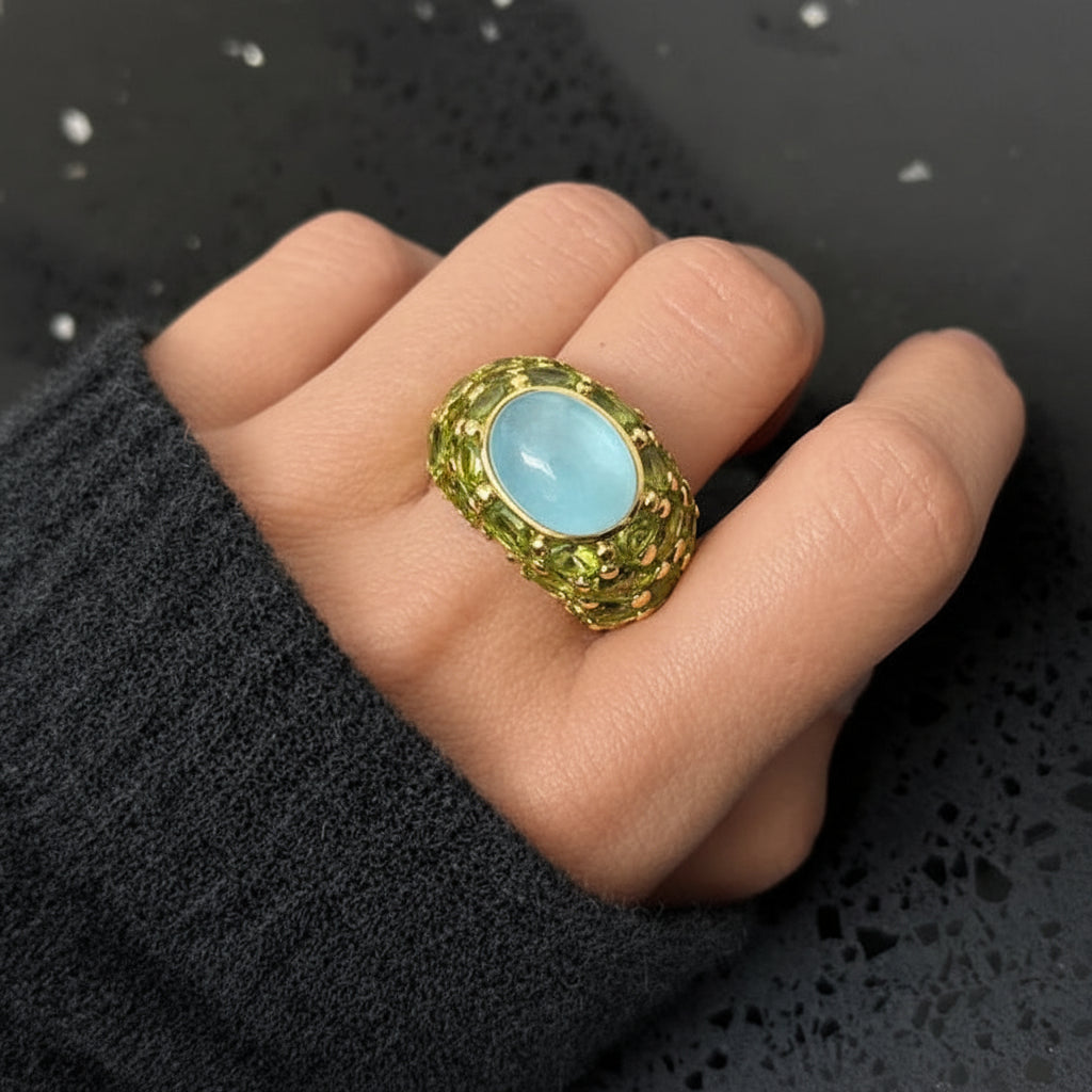 aquamarine and peridot ring in 18k yellow gold