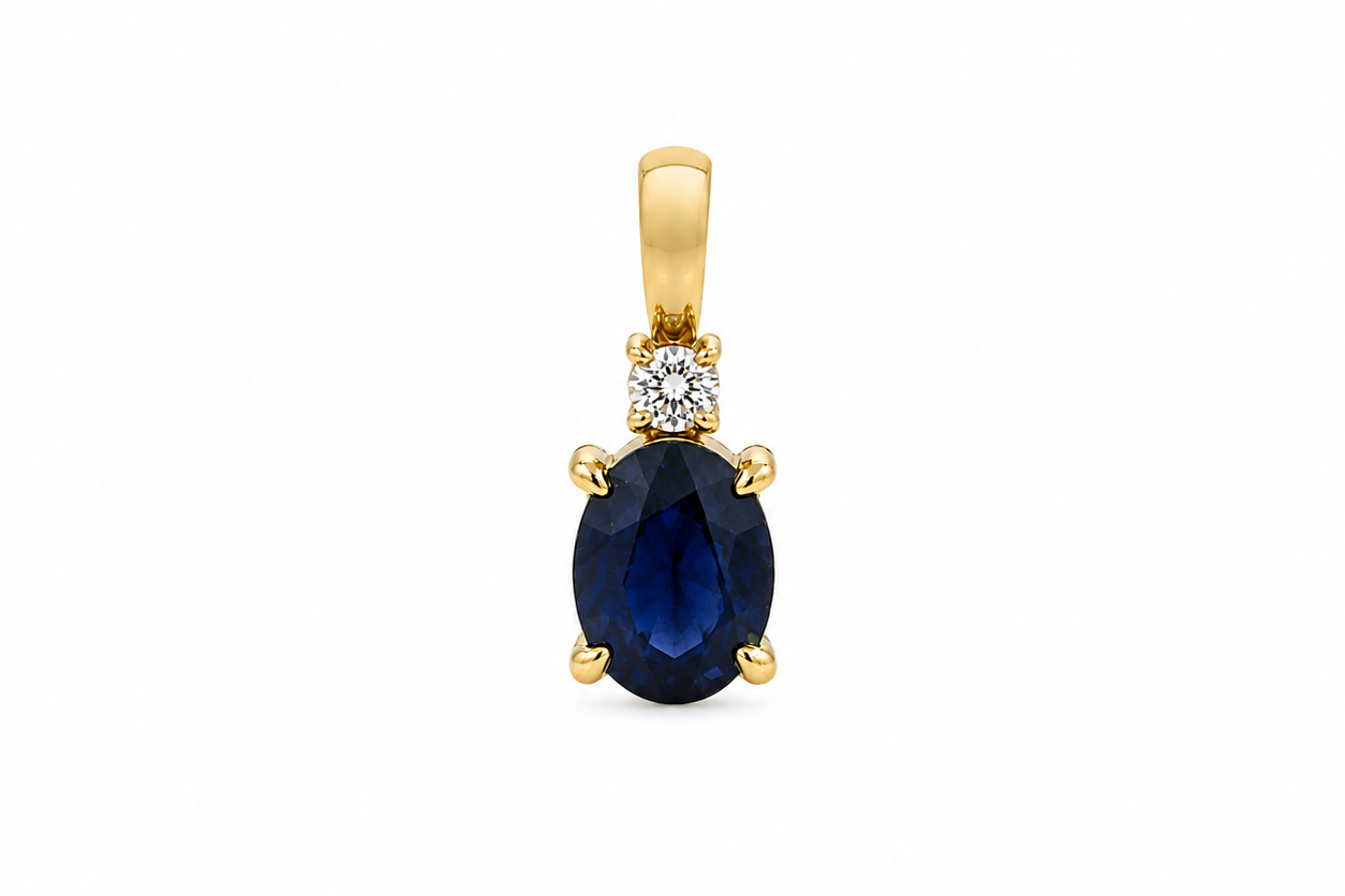 14k yellow gold necklace with 0.75 ct oval blue sapphire and diamond