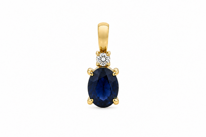 14k yellow gold necklace with 0.75 ct oval blue sapphire and diamond