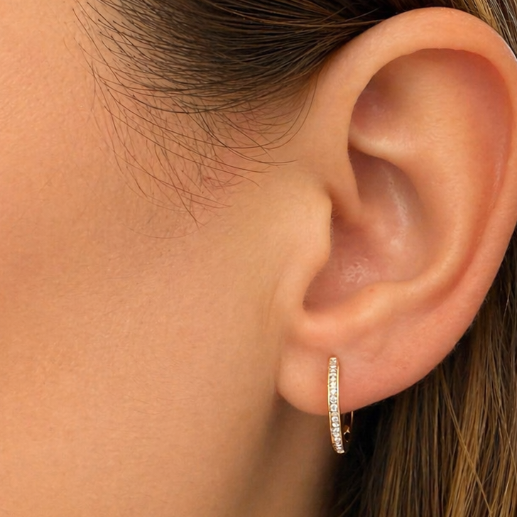 18k yellow gold baguette diamond hoop earrings by Diamond Tales