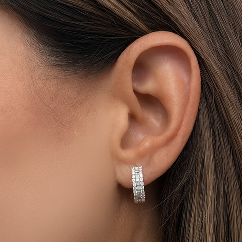 18k yellow gold baguette and diamond hoop earrings by Diamond Tales