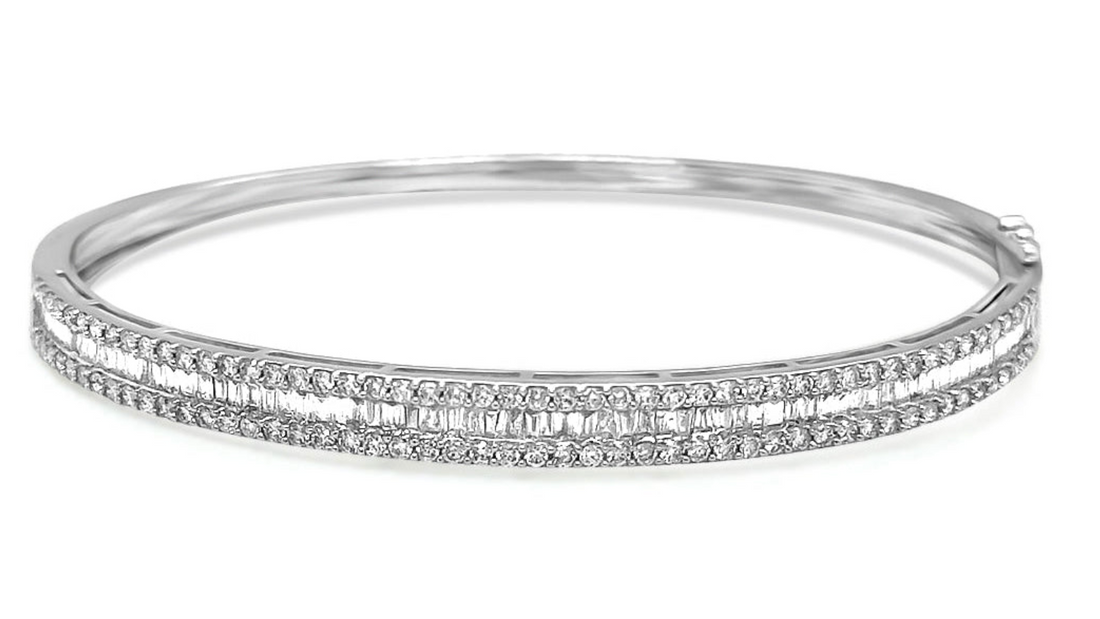 18k gold bangle bracelet with baguette and round brilliant diamonds by Diamond Tales